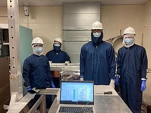 Summer research team gowned up for the cleanroom.
